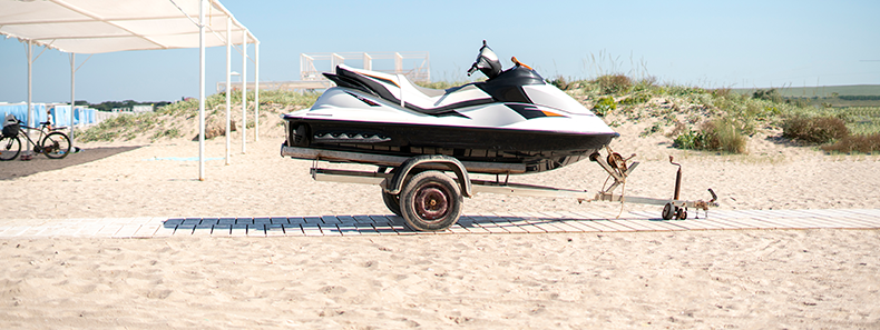 jet ski on trailer at the beach