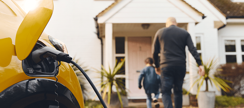 family with EV hybrid car