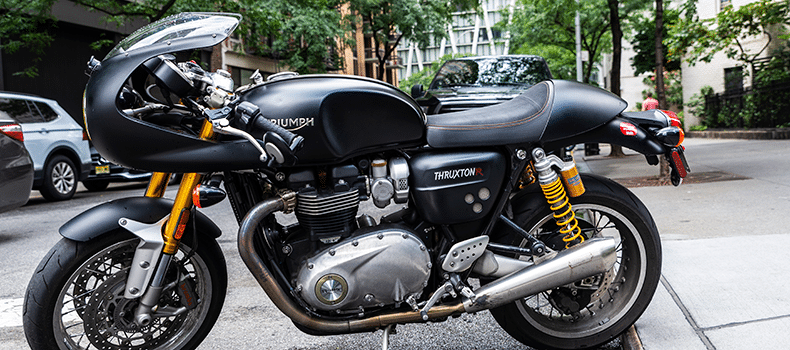 a black motorcycle prepped for shipping