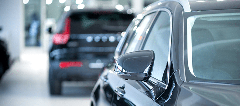 two black cars ready for shipping